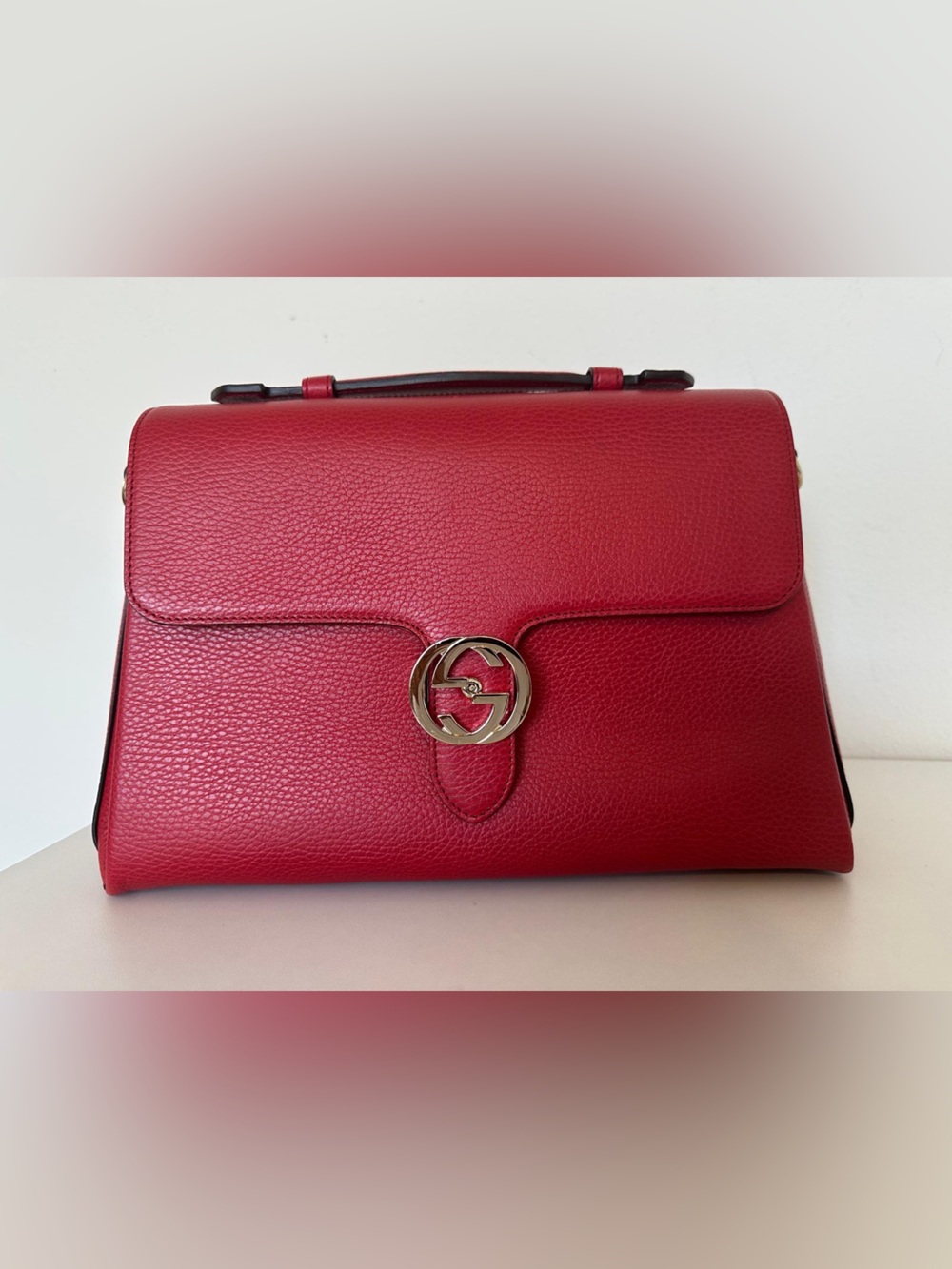Like New Authentic Gucci Interlocking G Top Handle Shoulder Bag Medium in Red.